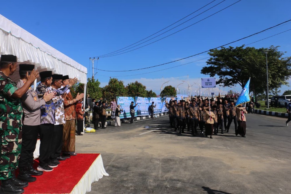 MTQ Aceh ke-37, Pidie Jaya, Bupati Sibral Malasyi, Pawai Ta’aruf MTQ, Syiar Al-Qur’an, Forkopimda Pidie Jaya, MTQ Aceh 2025