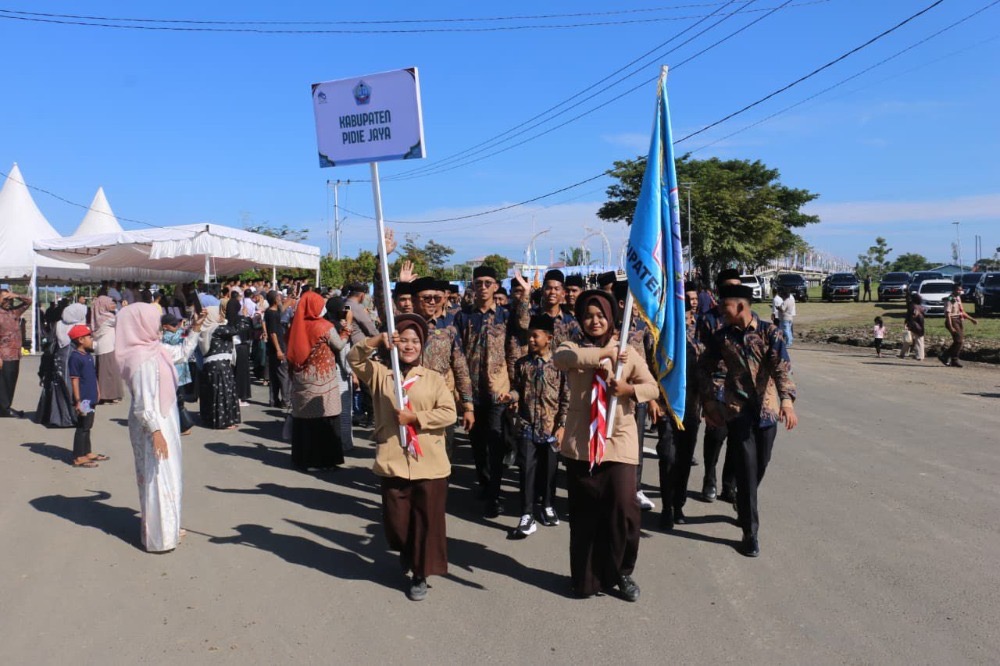 MTQ Aceh ke-37, Pidie Jaya, Bupati Sibral Malasyi, Pawai Ta’aruf MTQ, Syiar Al-Qur’an, Forkopimda Pidie Jaya, MTQ Aceh 2025