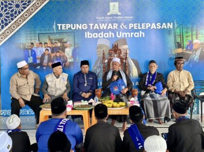 Abu Hasballah Nisam menyampaikan pesan kepada jamaah dan santri saat prosesi peusijuek keberangkatan Kloter 69 di Nisam, Aceh Utara